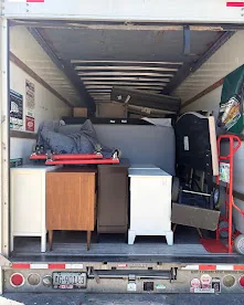 Furniture loaded inside a moving truck