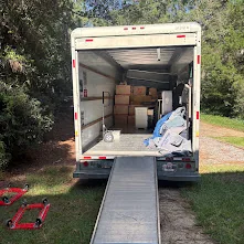 Moving truck with ramp ready for loading